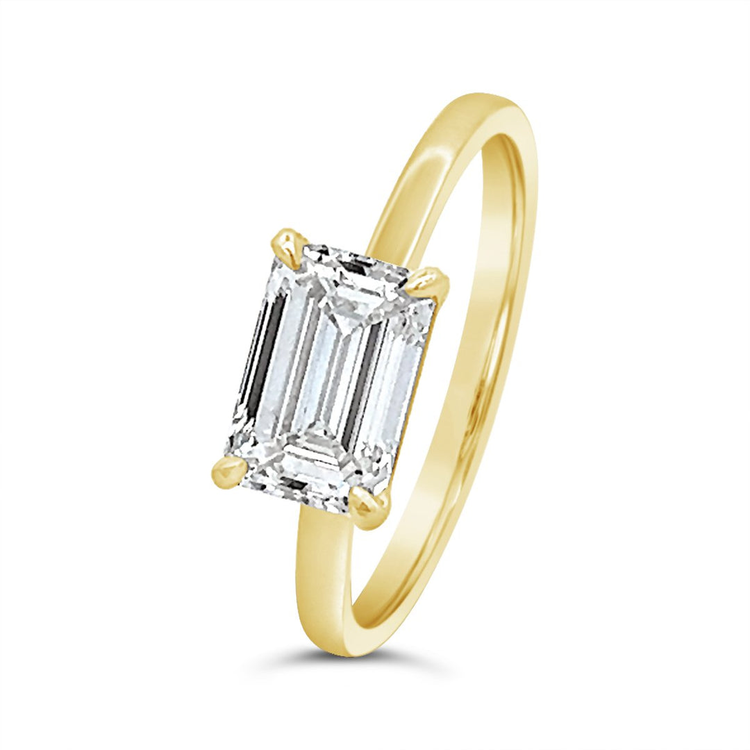 East To West Set Emerald Diamond Engagement Ring