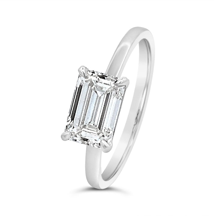 East To West Set Emerald Diamond Engagement Ring