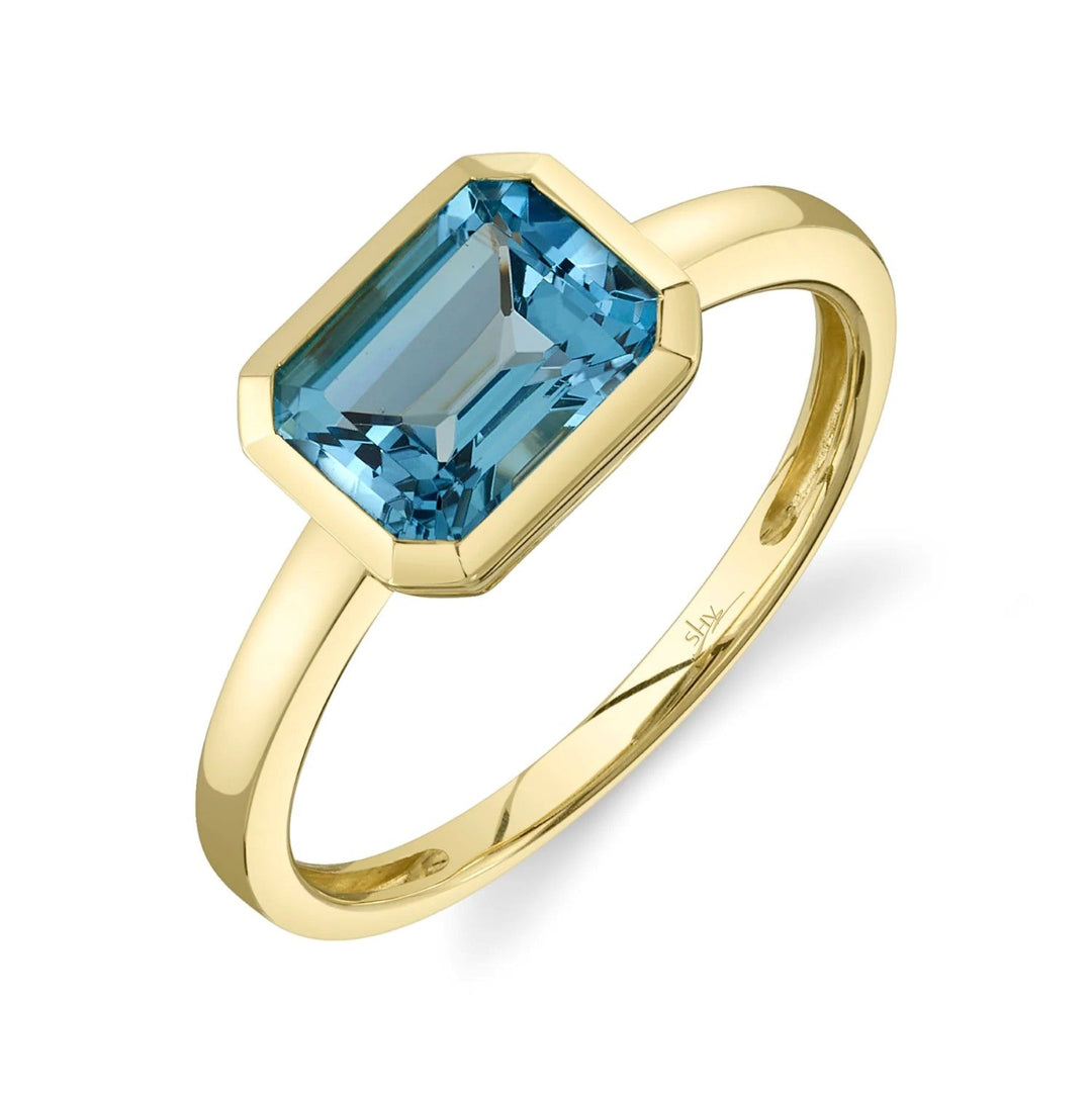 Yellow Gold Bezel Set Blue Topaz Solitaire Ring
