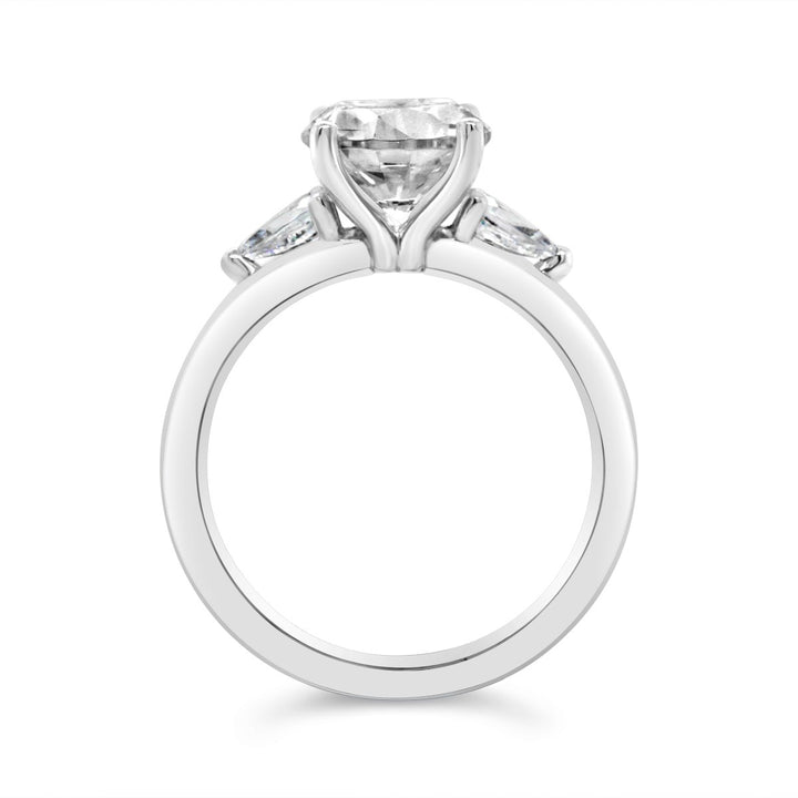 Three Stone Diamond Engagement Ring with Pear Shape Side Diamonds