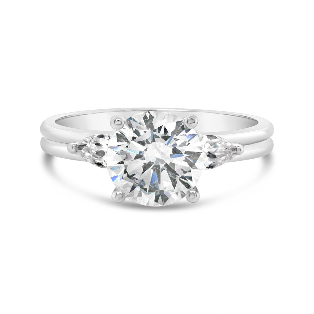 Three Stone Diamond Engagement Ring with Pear Shape Side Diamonds