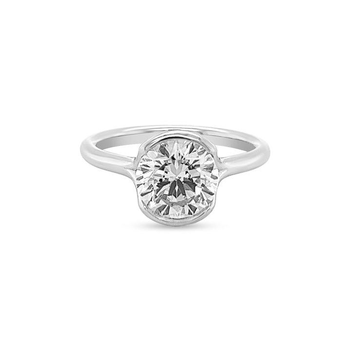Half-Bezel Cathedral Solitaire Diamond Engagement Ring
