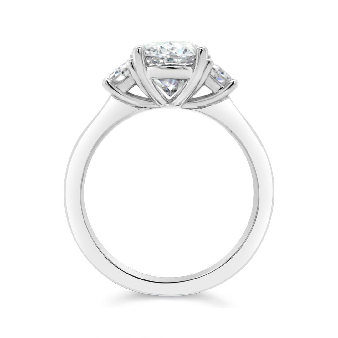 Three Stone Diamond Engagement Ring with Trapezoid Side Diamonds