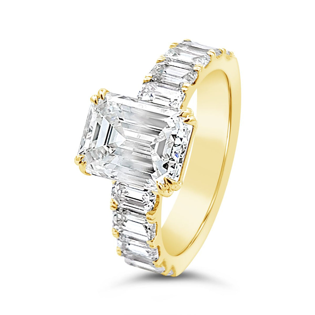 Modern Diamond Engagement Ring with Emerald side stones