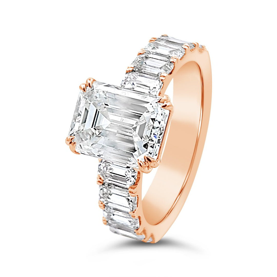 Modern Diamond Engagement Ring with Emerald side stones