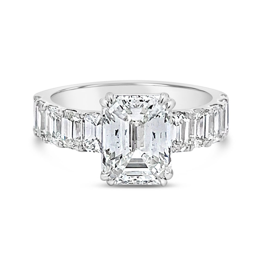 Modern Diamond Engagement Ring with Emerald side stones