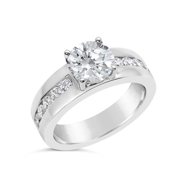 Engagement Ring with Wide Channel Set Band and Round Center