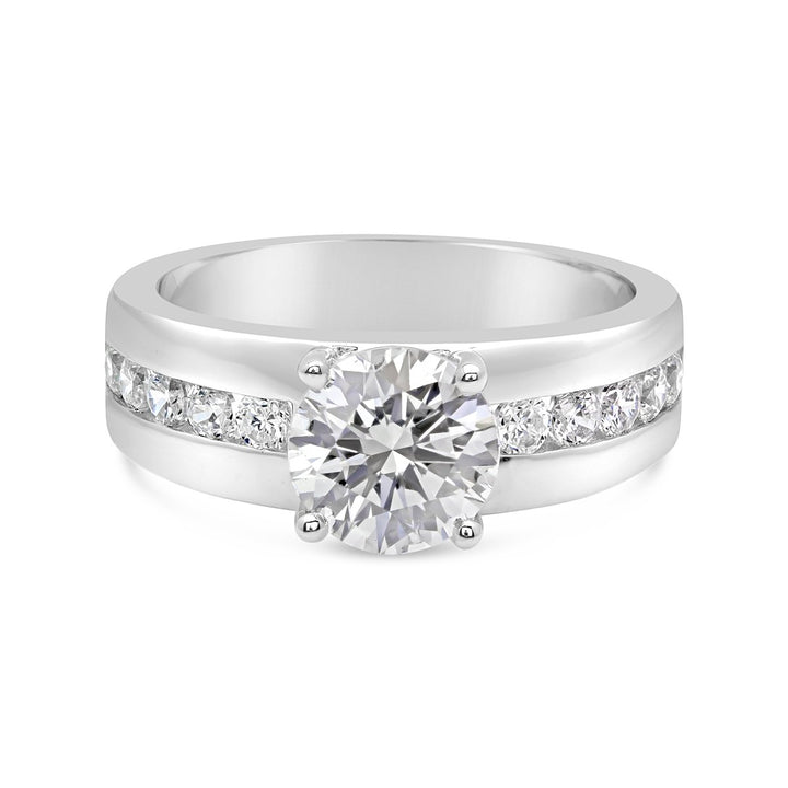 Engagement Ring with Wide Channel Set Band and Round Center